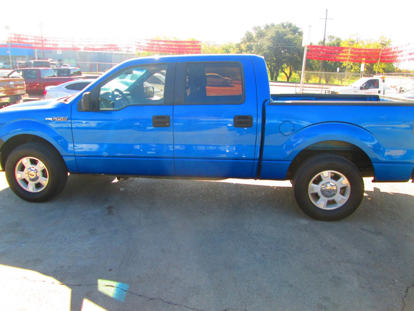 2009 BLUE Ford F-150 (1FTRW12W09F) with an 4.6L V8 OHC FFV engine, 4-Speed Automatic transmission, located at 1815 NE 28th St., Fort Worth, TX, 76106, (817) 625-6251, 32.795582, -97.333069 - Photo#9